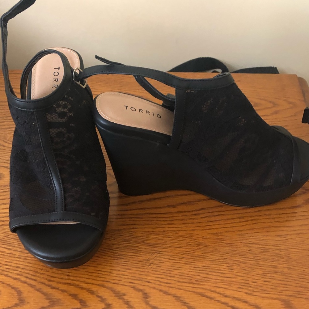 Black lace wedge shoes. Never worn!